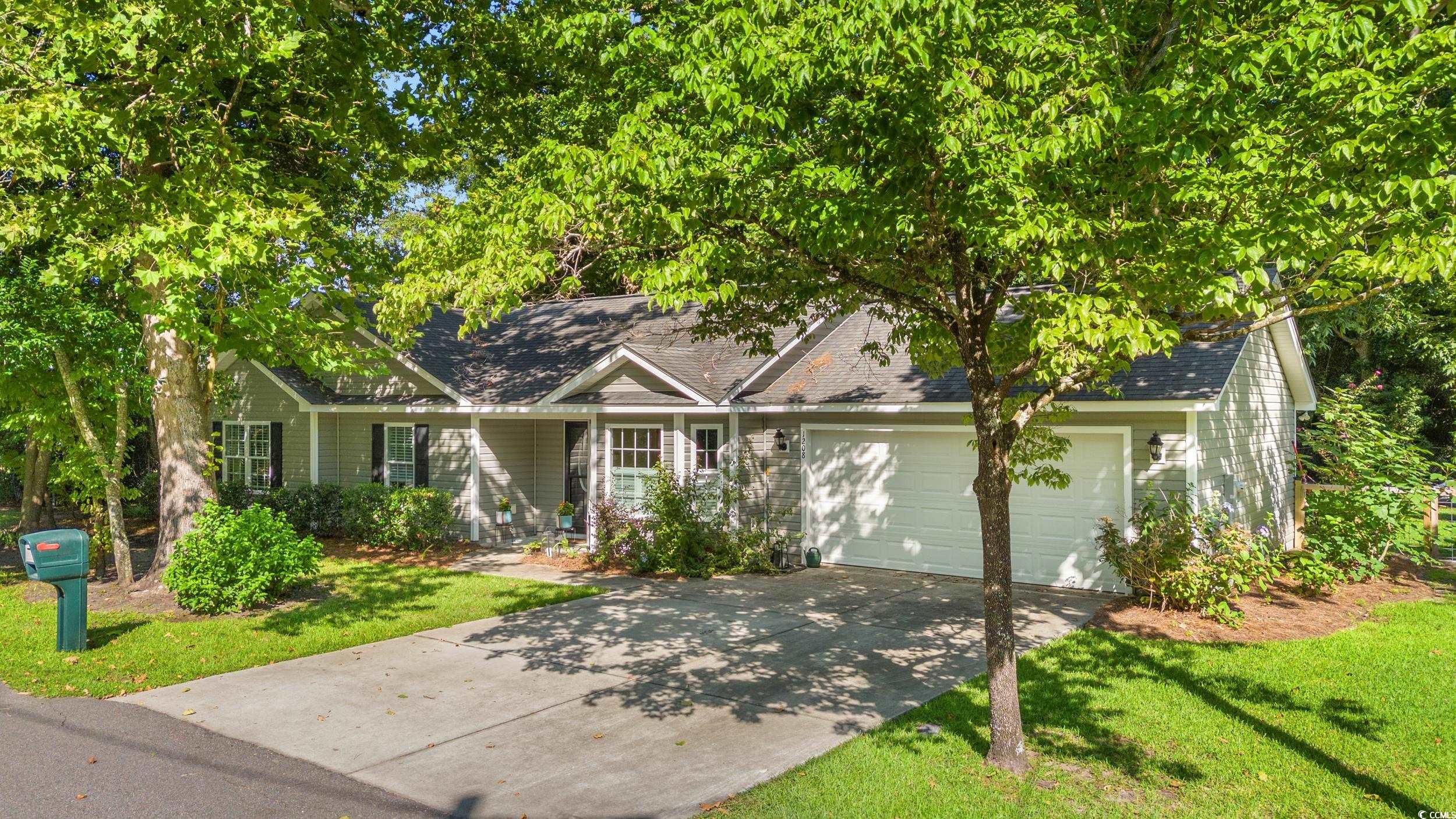 1208 10th Avenue Conway, SC 29526 - Photo 2 of 34 Single story home featuring a garage and a front l