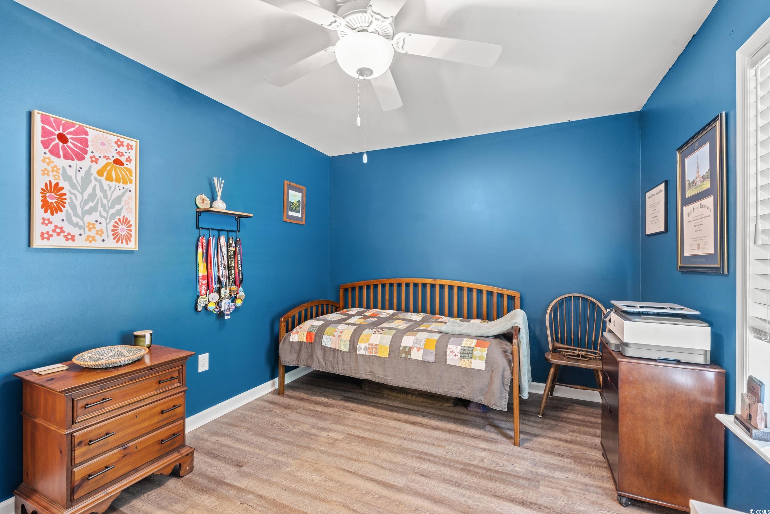 1208 10th Avenue Conway, SC 29526 - Photo 21 of 34 Bedroom featuring light hardwood / wood-style floo