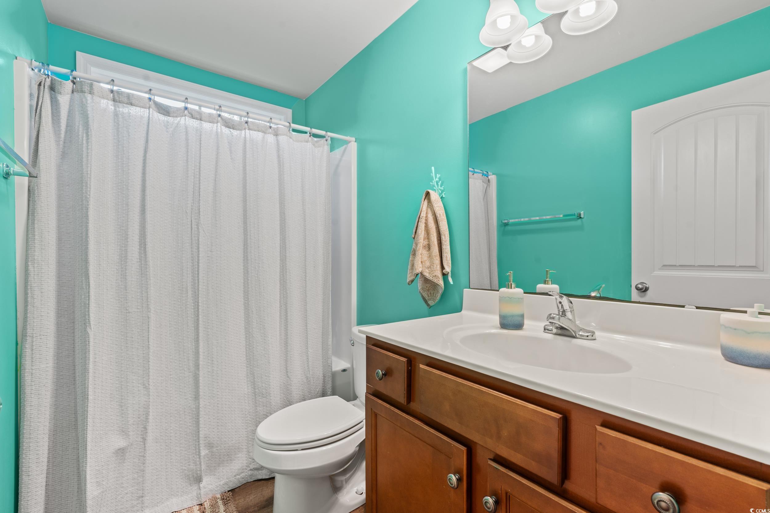 1208 10th Avenue Conway, SC 29526 - Photo 23 of 34 Bathroom with vanity and toilet