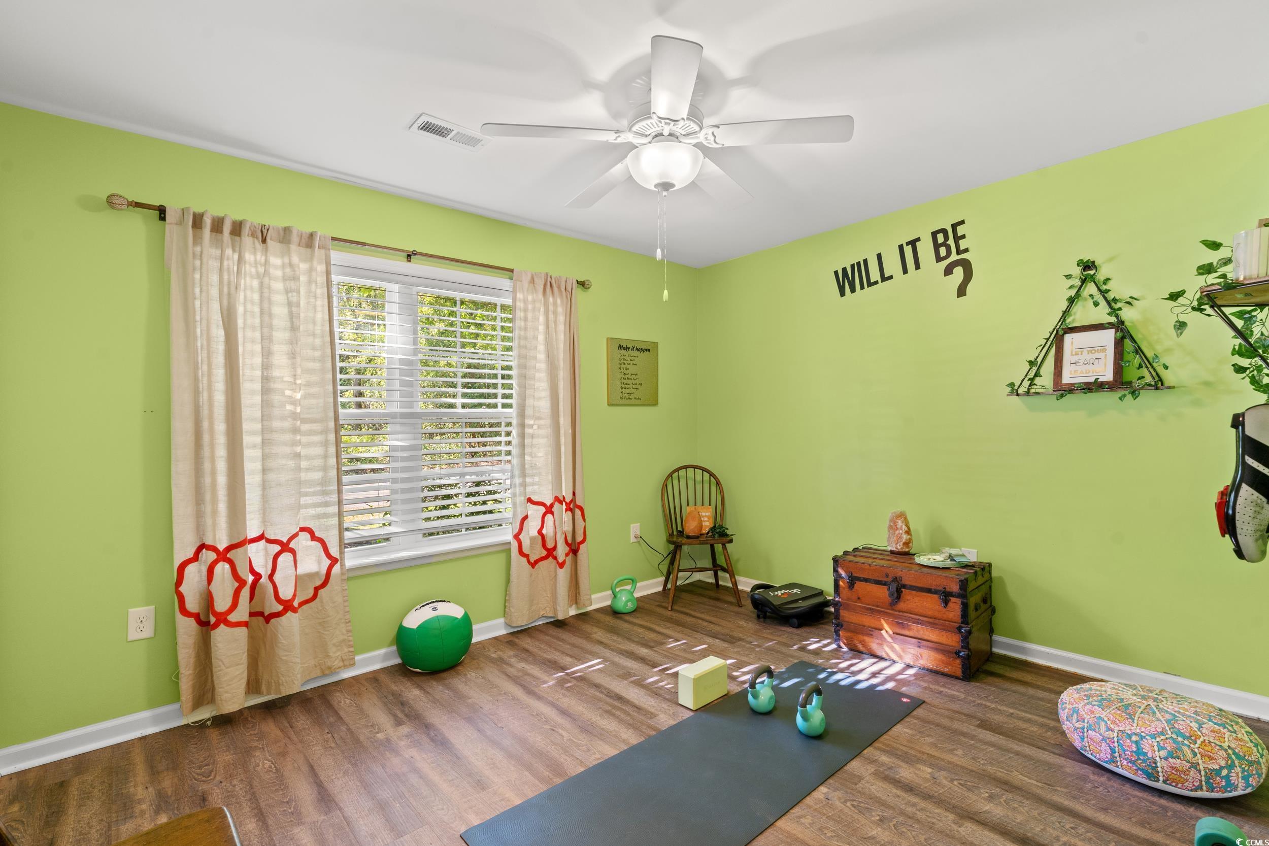 1208 10th Avenue Conway, SC 29526 - Photo 24 of 34 Workout area with hardwood / wood-style flooring a