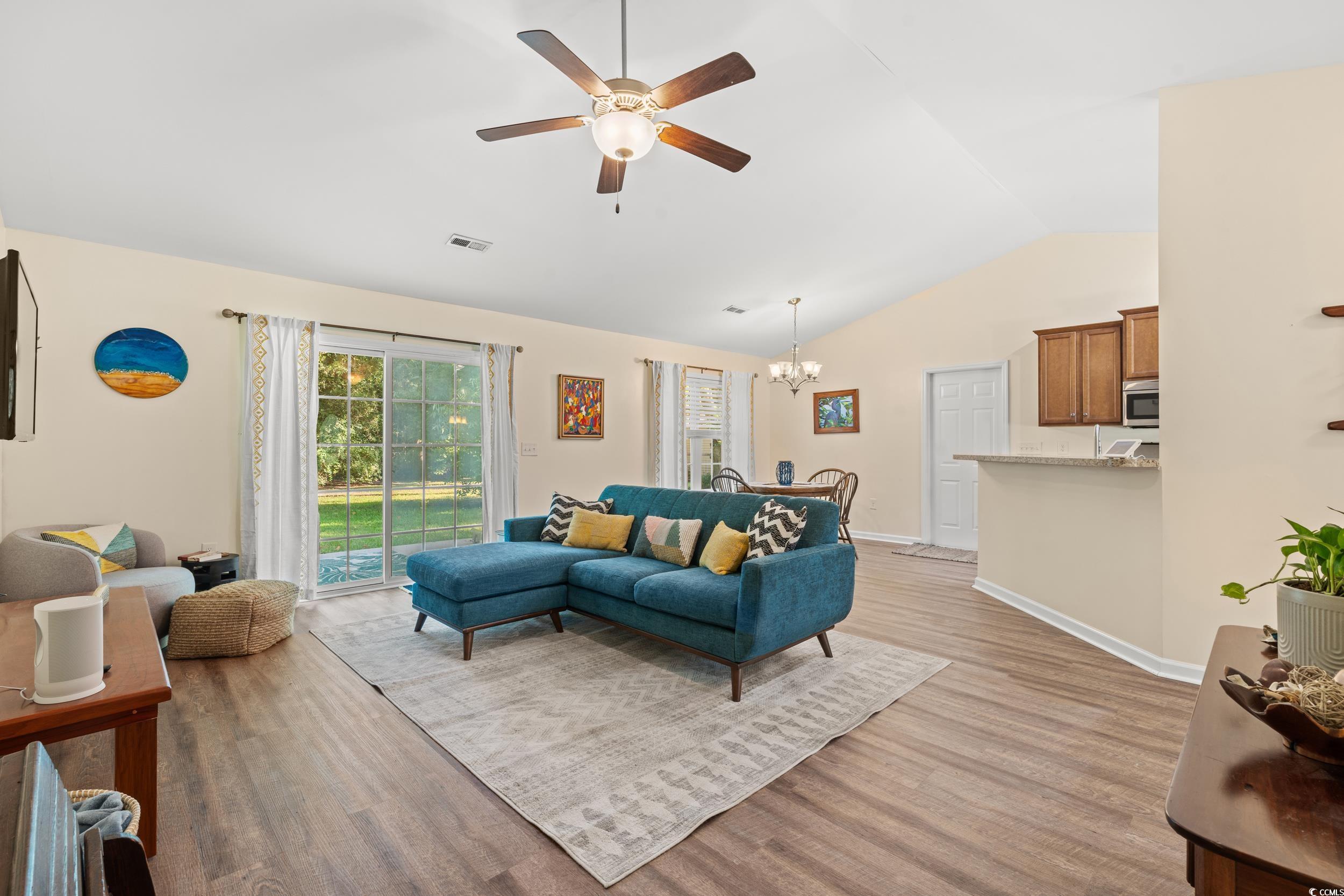 1208 10th Avenue Conway, SC 29526 - Photo 4 of 34 Living room featuring lofted ceiling, ceiling fan
