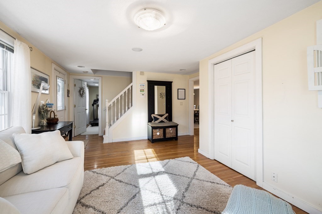 18 Harris Street Clinton, MA 01510 - Photo 14 of 31 a living room with furniture and a fireplace