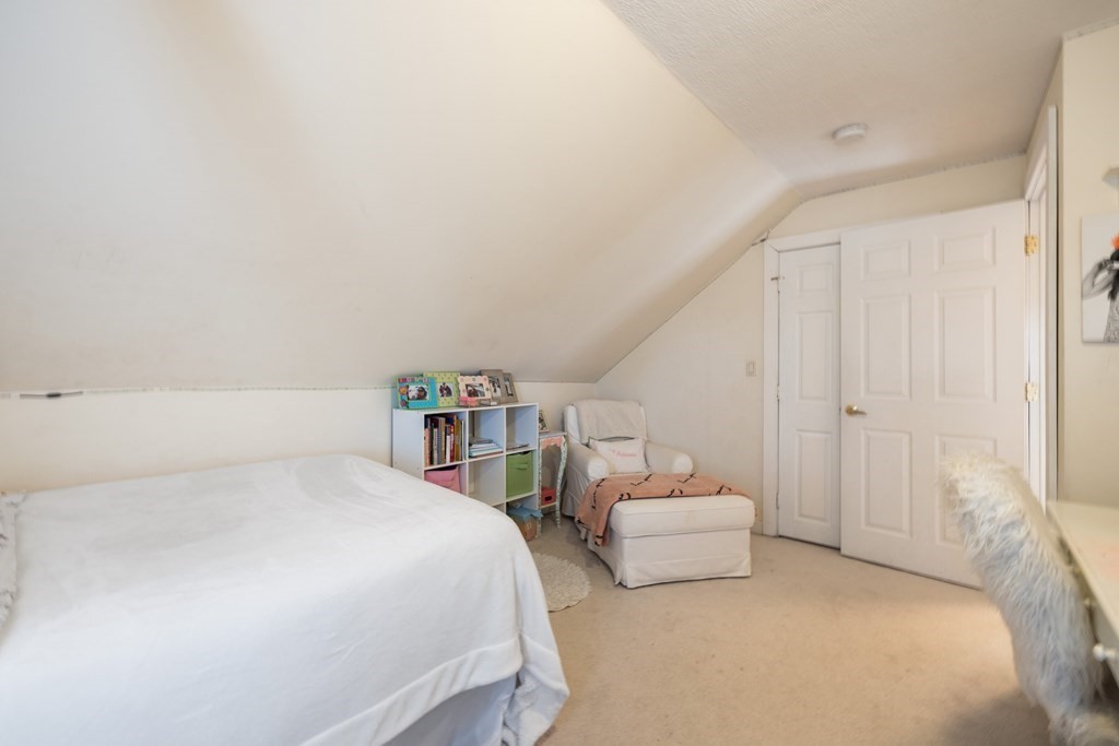 18 Harris Street Clinton, MA 01510 - Photo 21 of 31 a bedroom with two beds and white walls