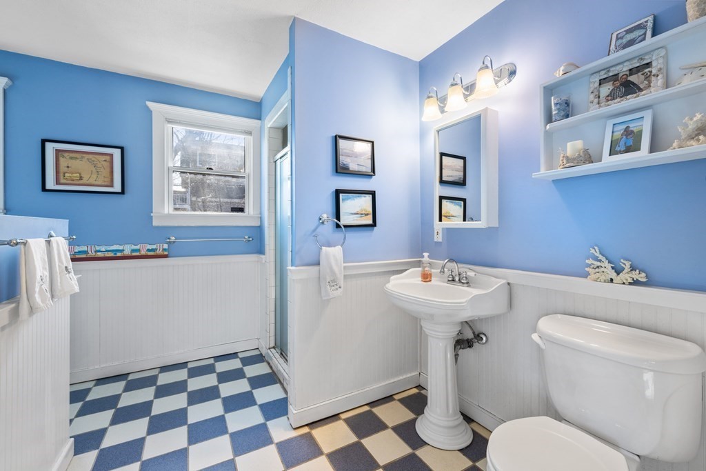18 Harris Street Clinton, MA 01510 - Photo 24 of 31 a bathroom with a sink a toilet a shower and a mirror