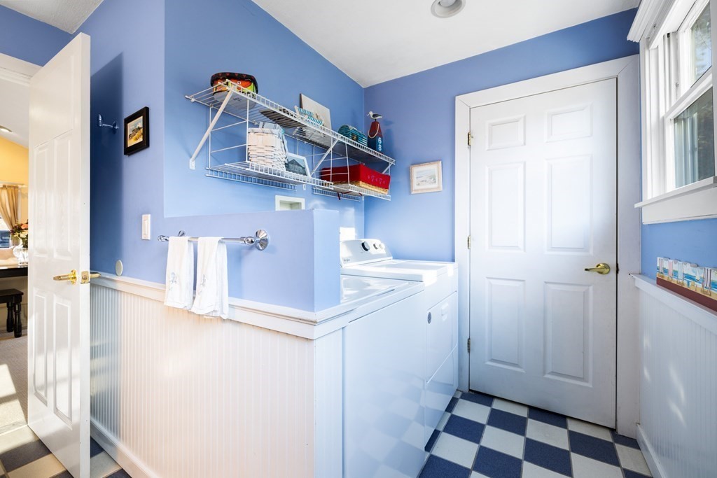 18 Harris Street Clinton, MA 01510 - Photo 25 of 31 a room with a walk in closet and wooden floor