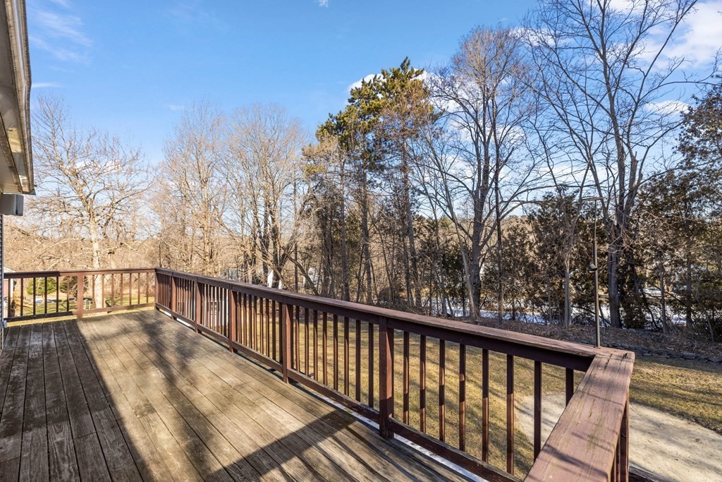 18 Harris Street Clinton, MA 01510 - Photo 30 of 31 a view of balcony with wooden floor and fence