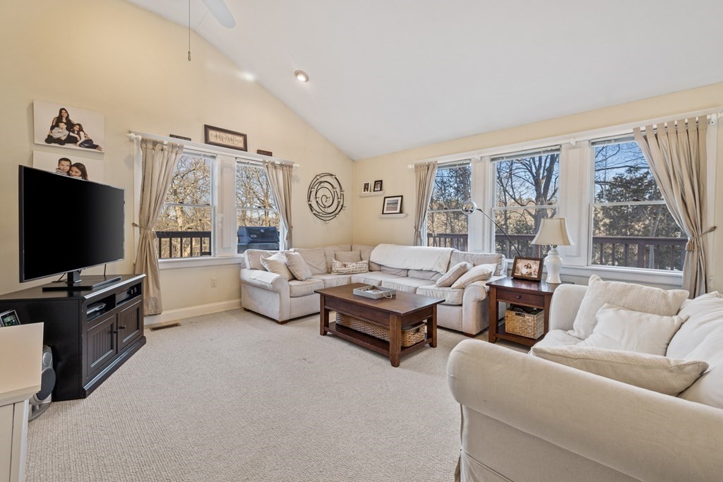 18 Harris Street Clinton, MA 01510 - Photo 9 of 31 a living room with furniture and a flat screen tv