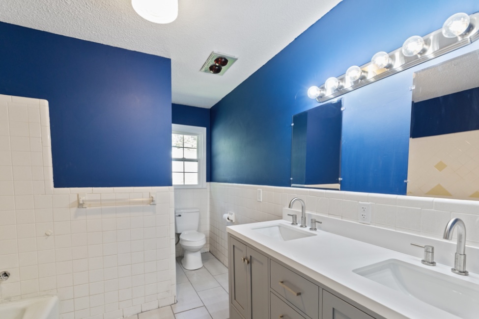 104 Doyle Drive Seneca, SC 29678 - Photo 9 of 19 This bright bathroom features a spacious dual vanity and elegant tile work.
