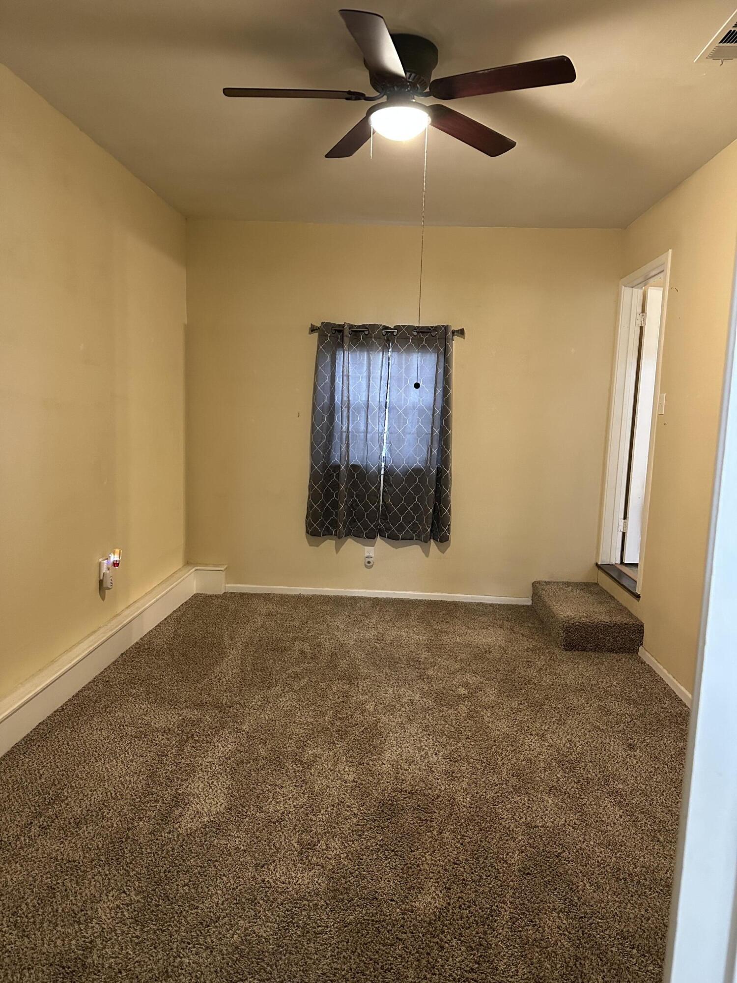 1907 38th Street Lubbock, TX 79412 - Photo 23 of 36 a view of an empty room
