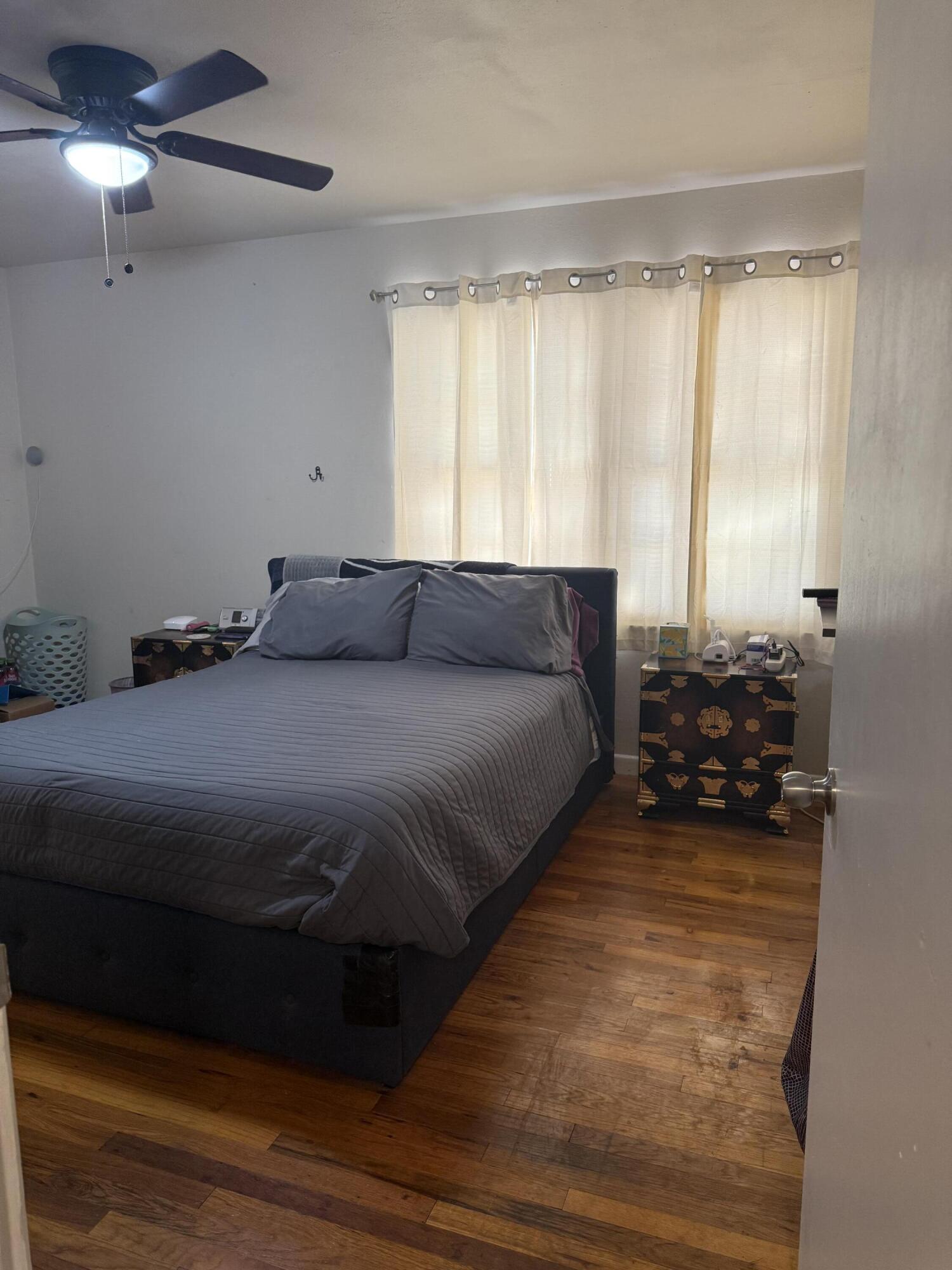 1907 38th Street Lubbock, TX 79412 - Photo 35 of 36 a bedroom with a bed and window