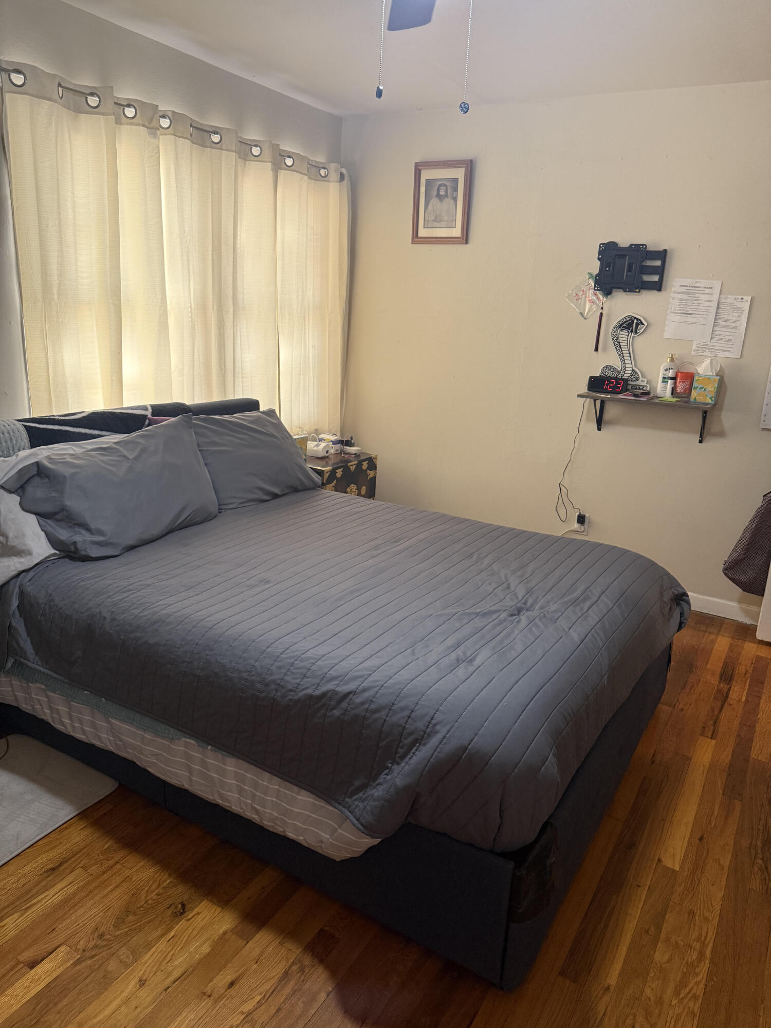 1907 38th Street Lubbock, TX 79412 - Photo 36 of 36 a bedroom with a bed and a window
