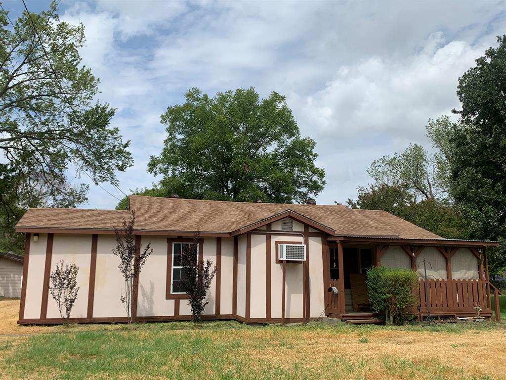 4115 Peachtree Road Balch Springs, TX 75180 - Photo 1 of 1 front view of a house with a yard