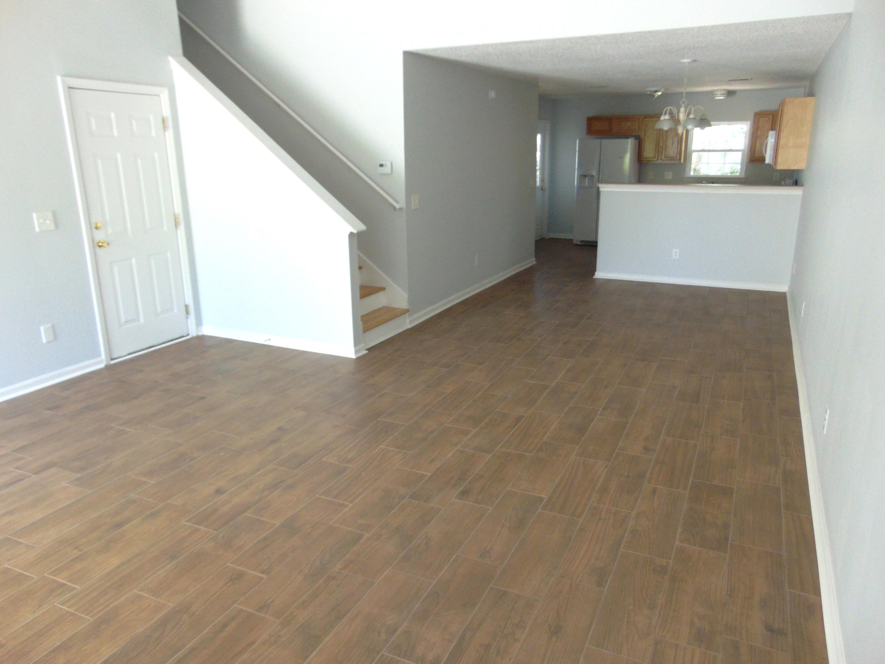 116 Spurrier Way, Unit A Moncks Corner, SC 29461 - Photo 2 of 39 WOODGRAIN TILE FLOORS