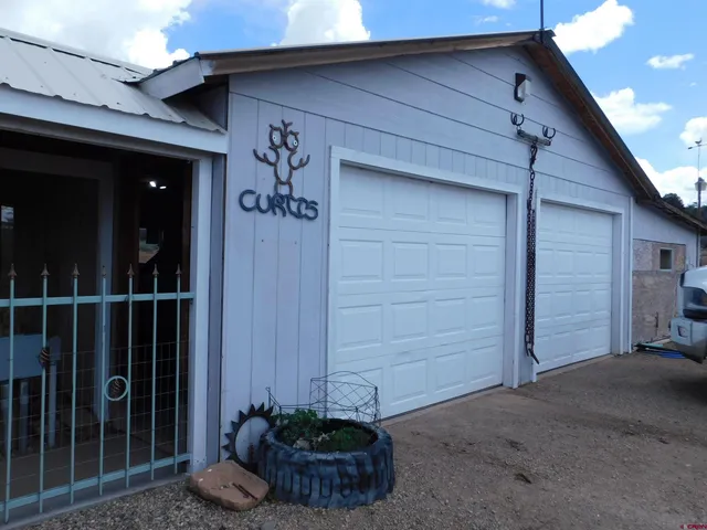 a view of outdoor space with sliding door and wooden floor