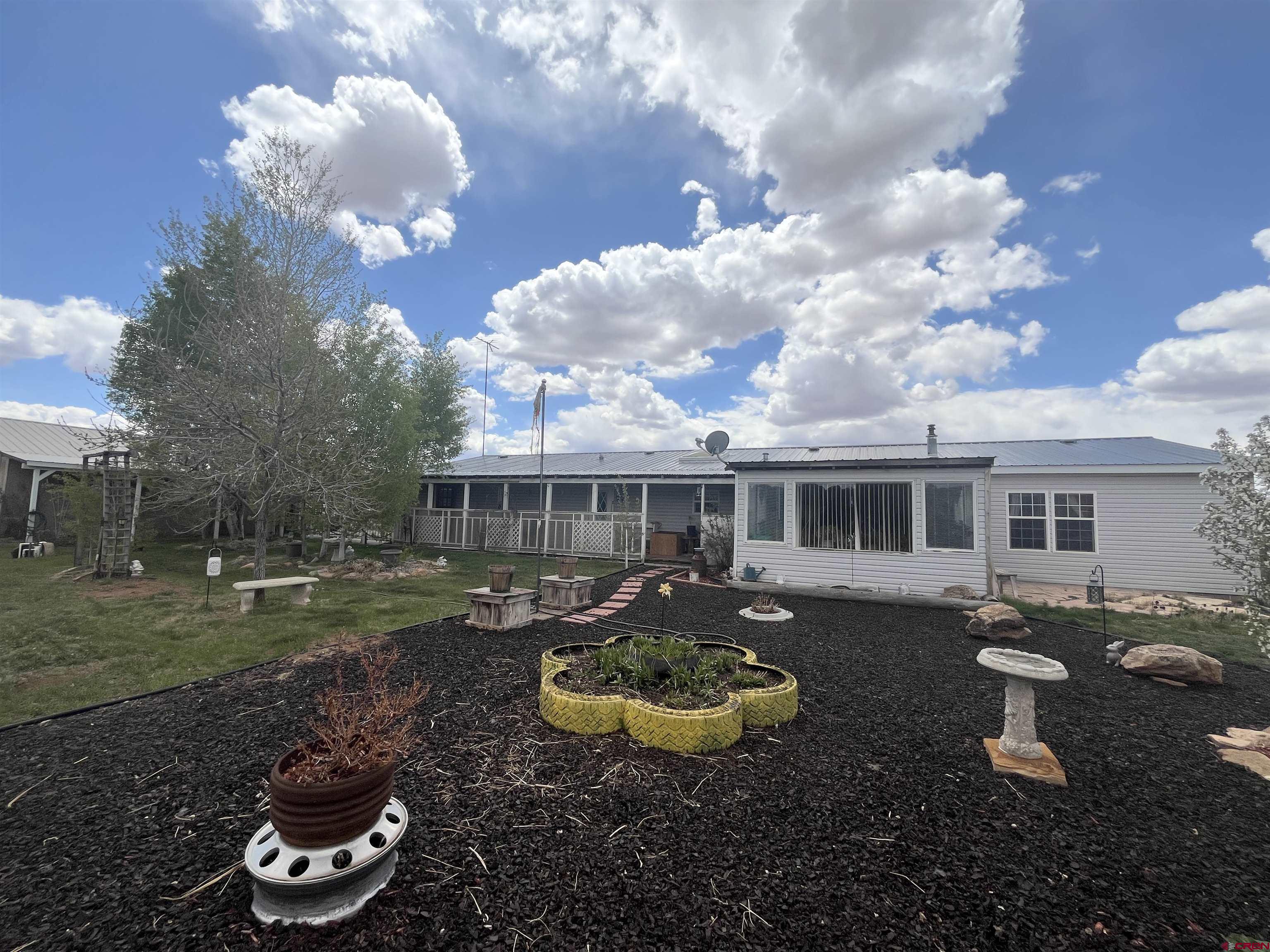 600 County Road 8F Egnar, CO 81325 - Photo 2 of 45 a view of a house with a yard