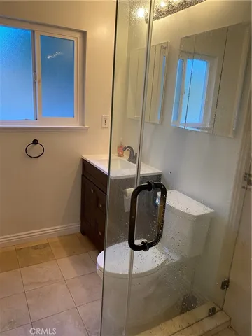 a bathroom with a sink and mirror