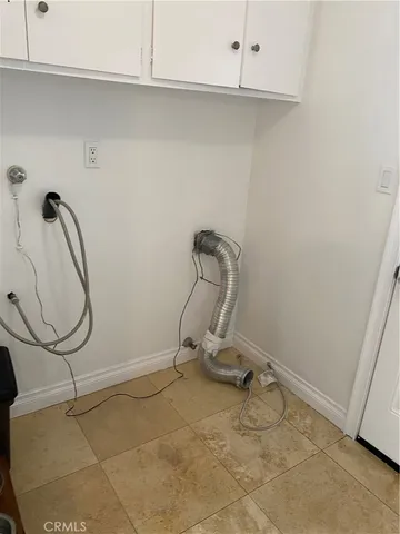 a view of a room with rack on the wall