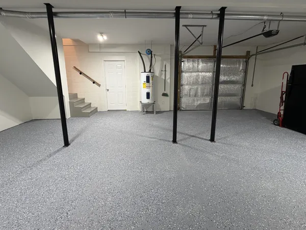 a view of an empty room with fan