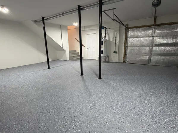 a view of an empty room with stairs