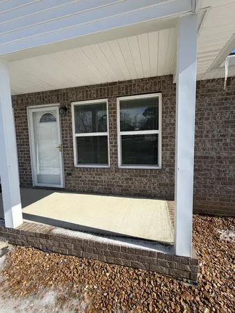 a view of entrance gate of a house