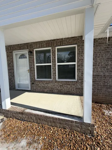 a view of entrance gate of a house