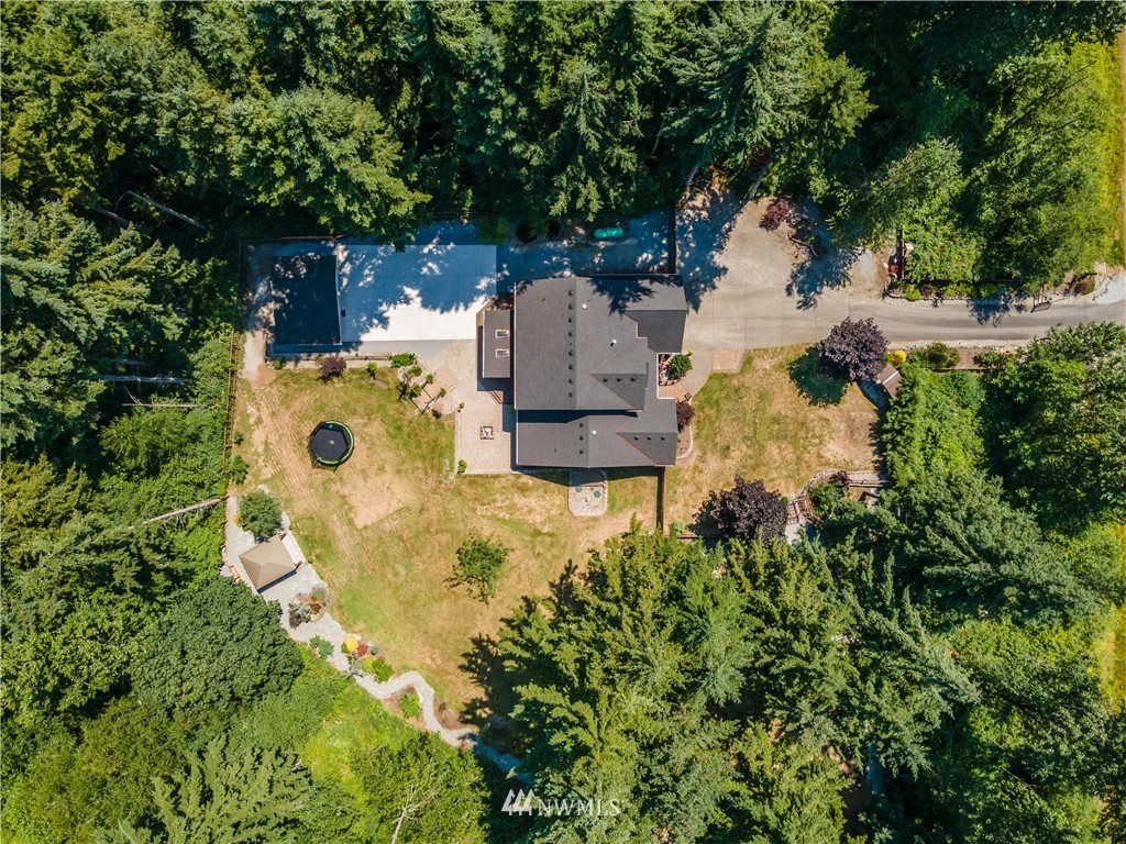 27515 Rose Road Arlington, WA 98223 - Photo 27 of 31 an aerial view of a house with yard swimming pool and outdoor seating