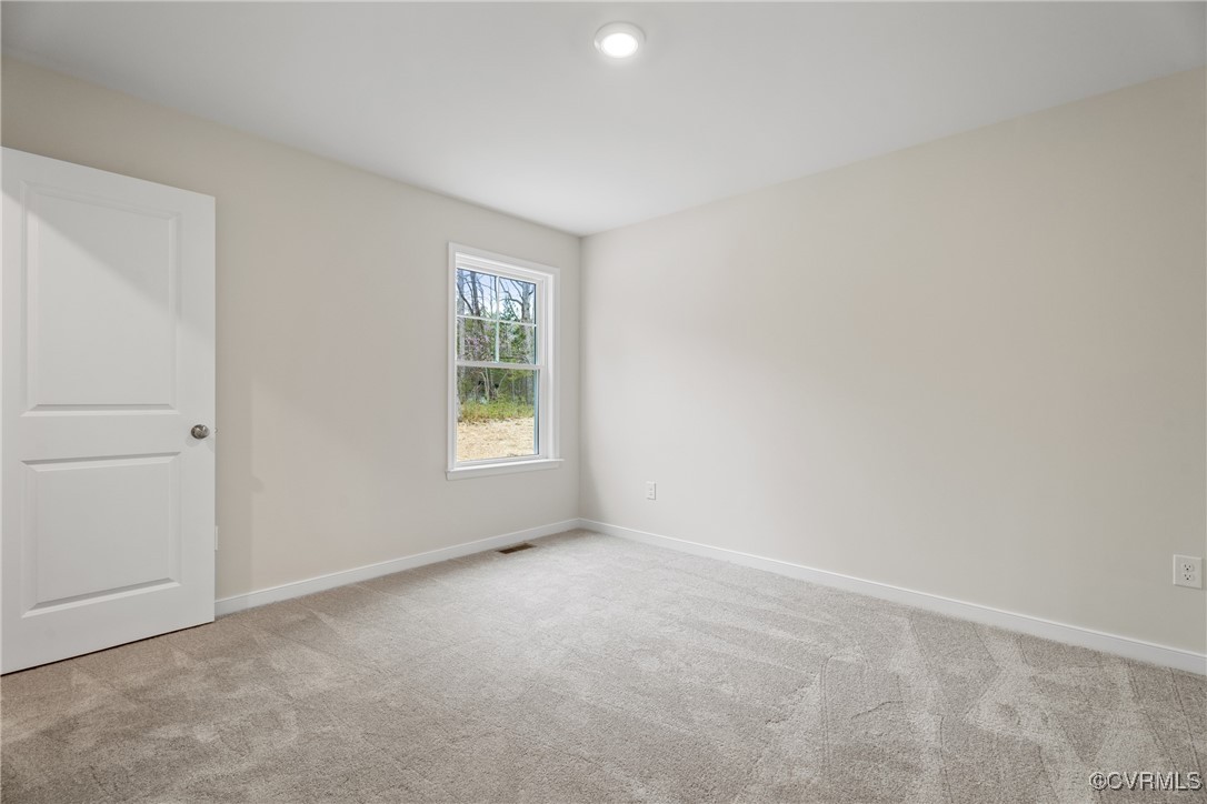 4865 Three Chopt Road Louisa, VA 23093 - Photo 12 of 14 an empty room with windows