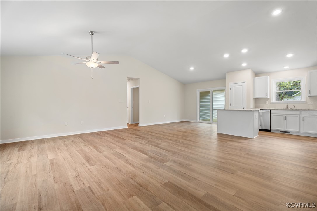 4865 Three Chopt Road Louisa, VA 23093 - Photo 4 of 14 a view of a livingroom with furniture wooden floor and chandelier