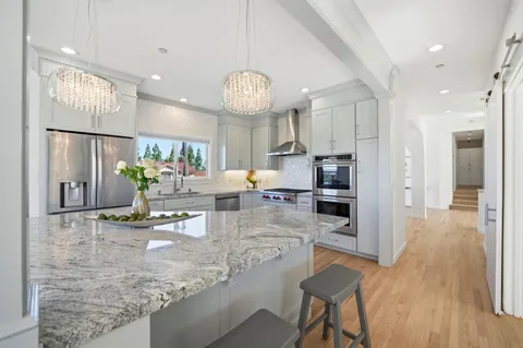 a view of a kitchen and dining area