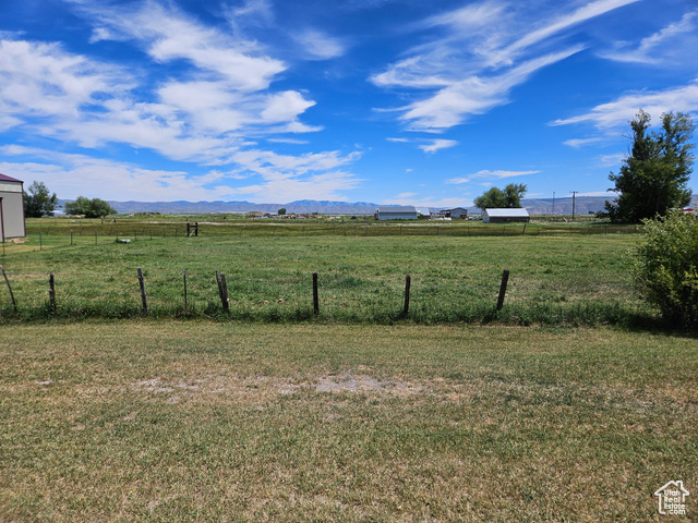 34 North 200th East Paris, ID 83261 - Photo 1 of 1 View of yard featuring a mountain view and a rural view