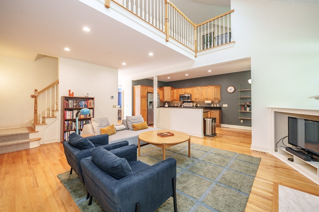 97 High Pine Circle, Unit 97 Wilbraham, MA 01095 - Photo 13 of 37 a living room with furniture and a flat screen tv