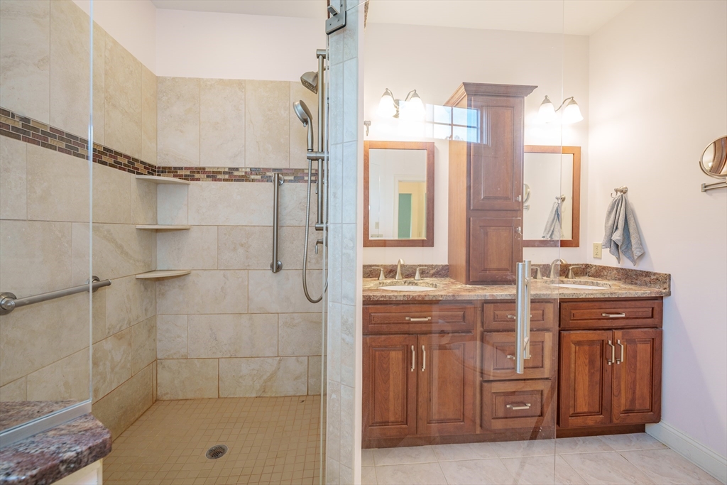 97 High Pine Circle, Unit 97 Wilbraham, MA 01095 - Photo 22 of 37 a bathroom with a tub sink and mirror