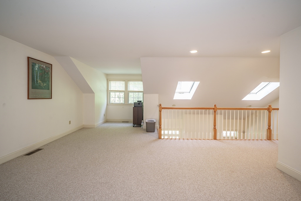 97 High Pine Circle, Unit 97 Wilbraham, MA 01095 - Photo 25 of 37 a view of an empty room with a window