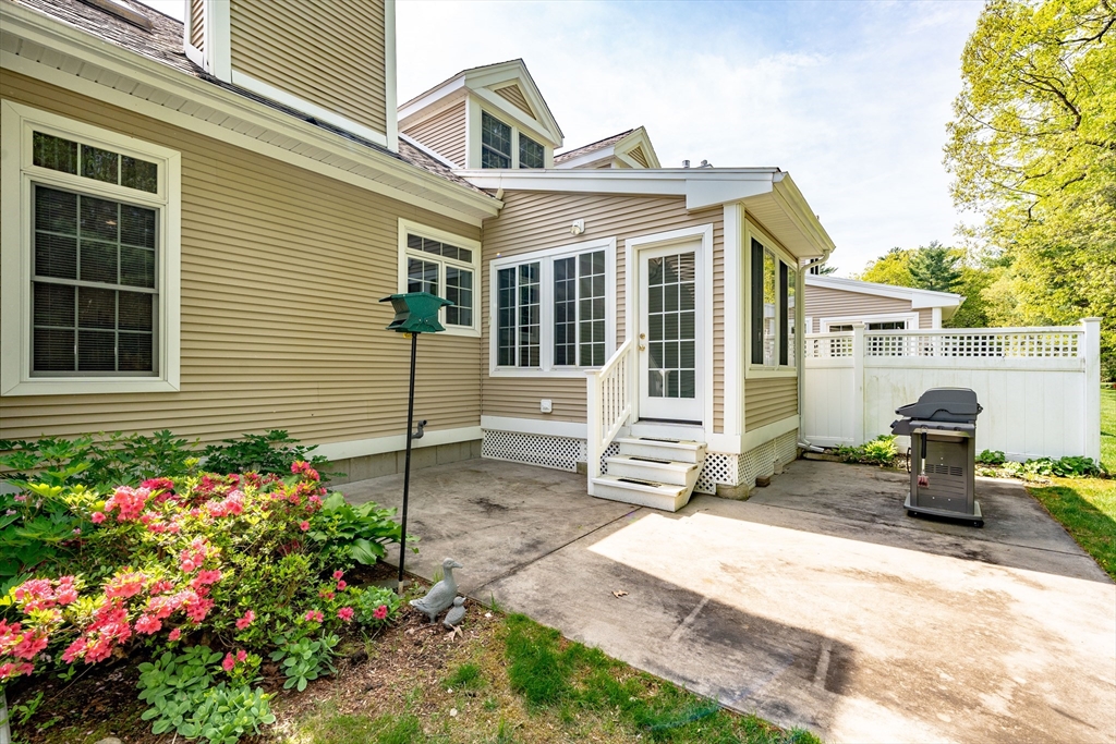 97 High Pine Circle, Unit 97 Wilbraham, MA 01095 - Photo 33 of 37 a front view of a house with a garden
