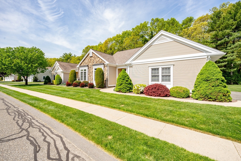 97 High Pine Circle, Unit 97 Wilbraham, MA 01095 - Photo 34 of 37 a front view of a house with a yard