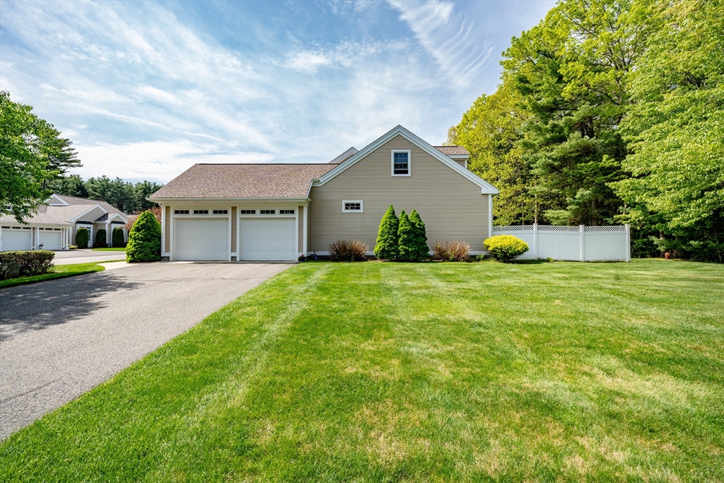 97 High Pine Circle, Unit 97 Wilbraham, MA 01095 - Photo 35 of 37 a front view of house with yard and green space