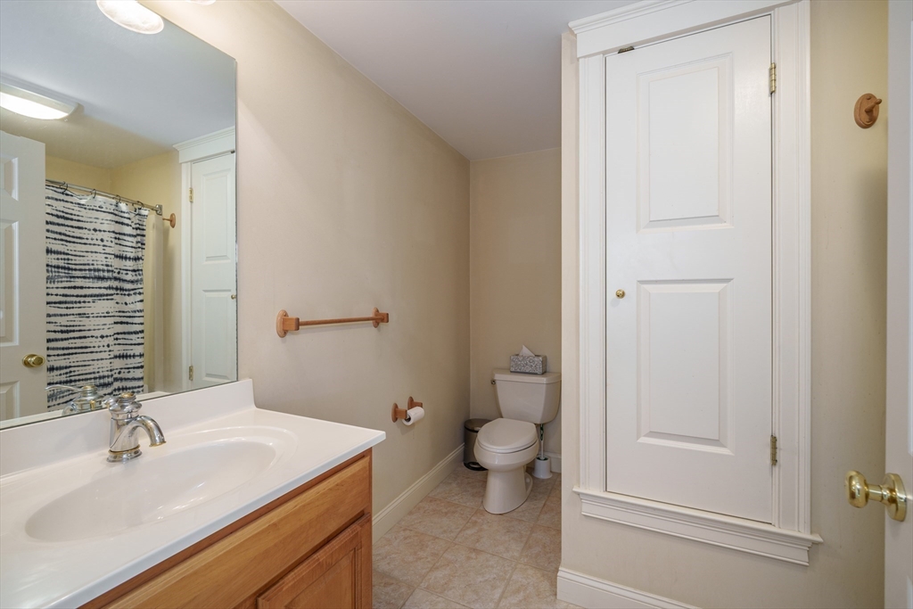 97 High Pine Circle, Unit 97 Wilbraham, MA 01095 - Photo 6 of 37 a bathroom with a sink a toilet and shower