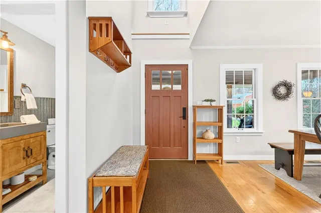 a view of an entryway with furniture and livingroom