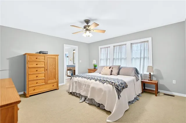 a bedroom with a bed and a closet