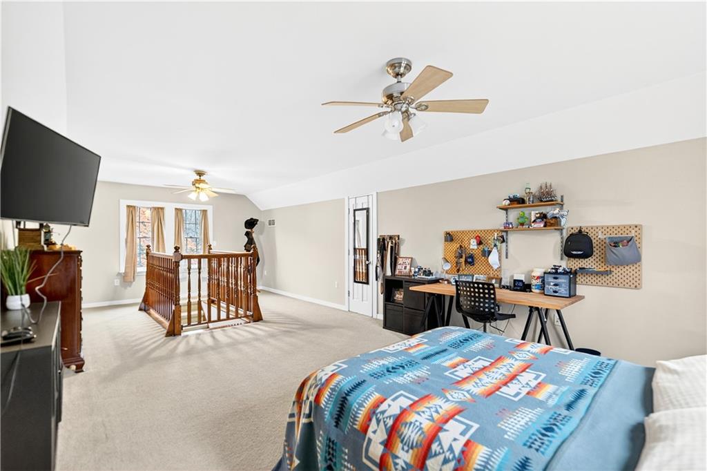 687 Old Millcreek Road Hookstown, PA 15050 - Photo 26 of 50 a bed room with a bed and a television