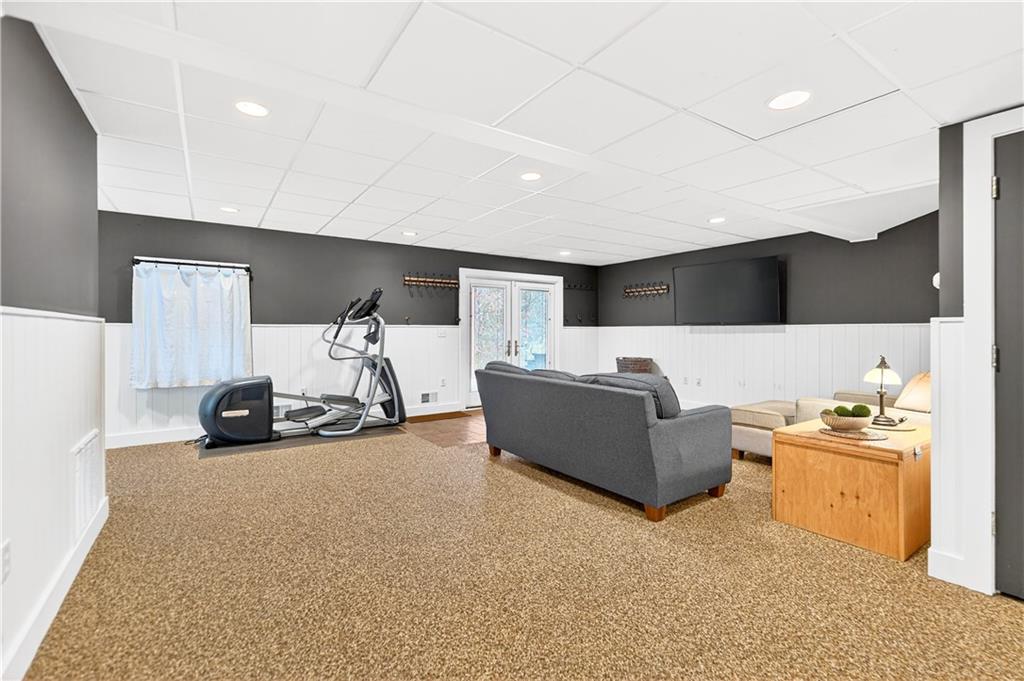 687 Old Millcreek Road Hookstown, PA 15050 - Photo 31 of 50 a living room with furniture and a flat screen tv
