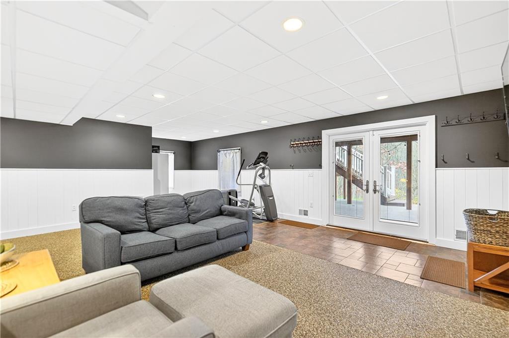 687 Old Millcreek Road Hookstown, PA 15050 - Photo 32 of 50 a living room with furniture and a flat screen tv