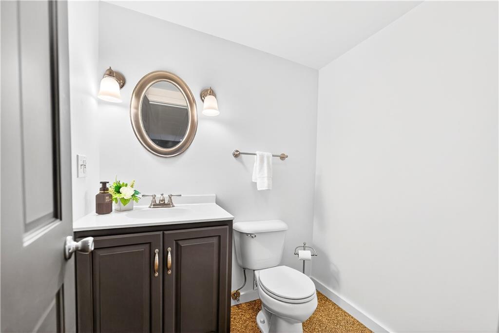 687 Old Millcreek Road Hookstown, PA 15050 - Photo 33 of 50 a bathroom with a sink a toilet and a mirror