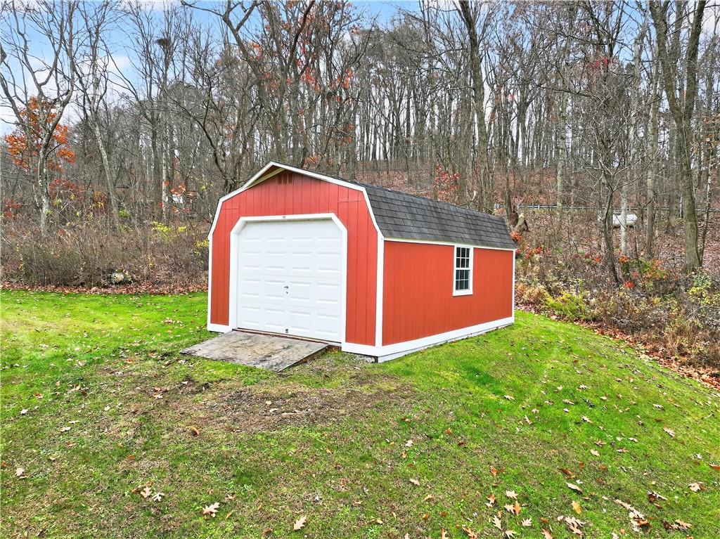 687 Old Millcreek Road Hookstown, PA 15050 - Photo 46 of 50 a backyard of a house with lots of green space