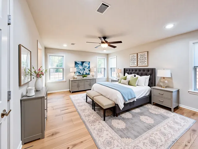 a bedroom with a large bed and a couch