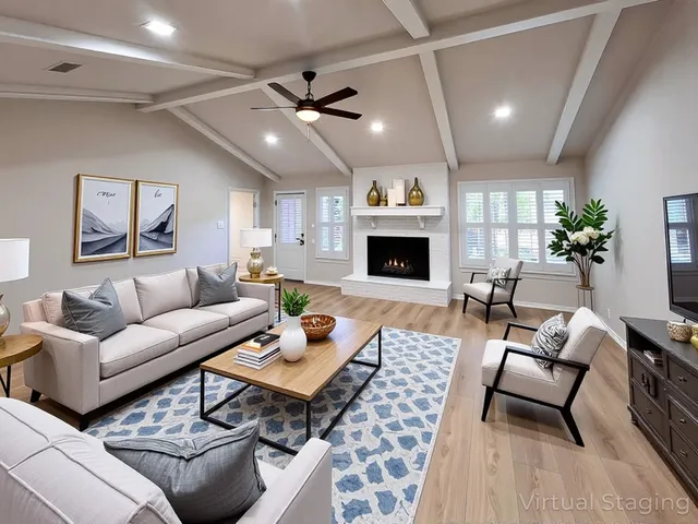 a living room with furniture and a fireplace