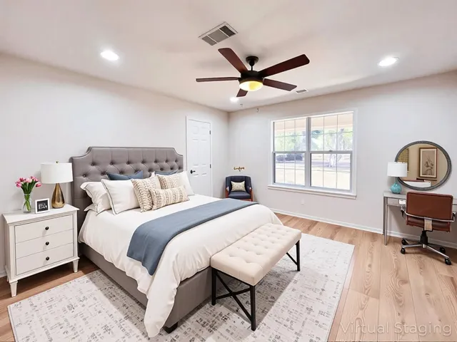 a bed room with a bed and a window