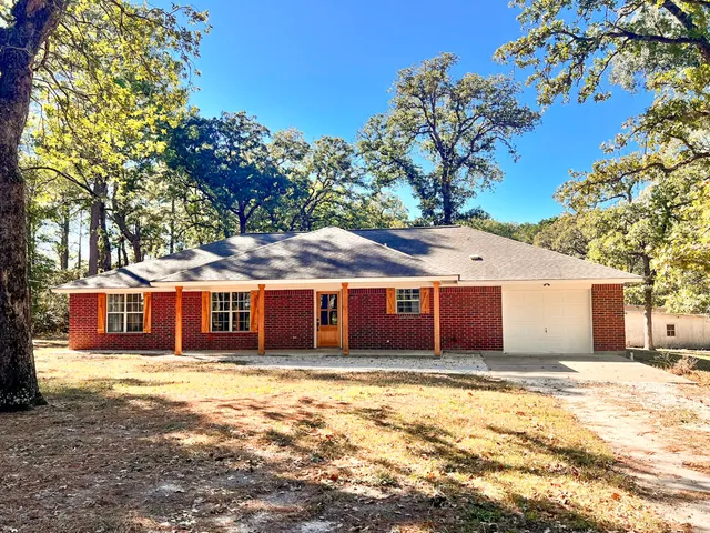 a view of a house with a swimming pool