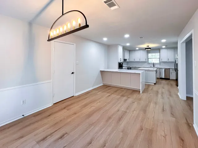 a view of kitchen and windows