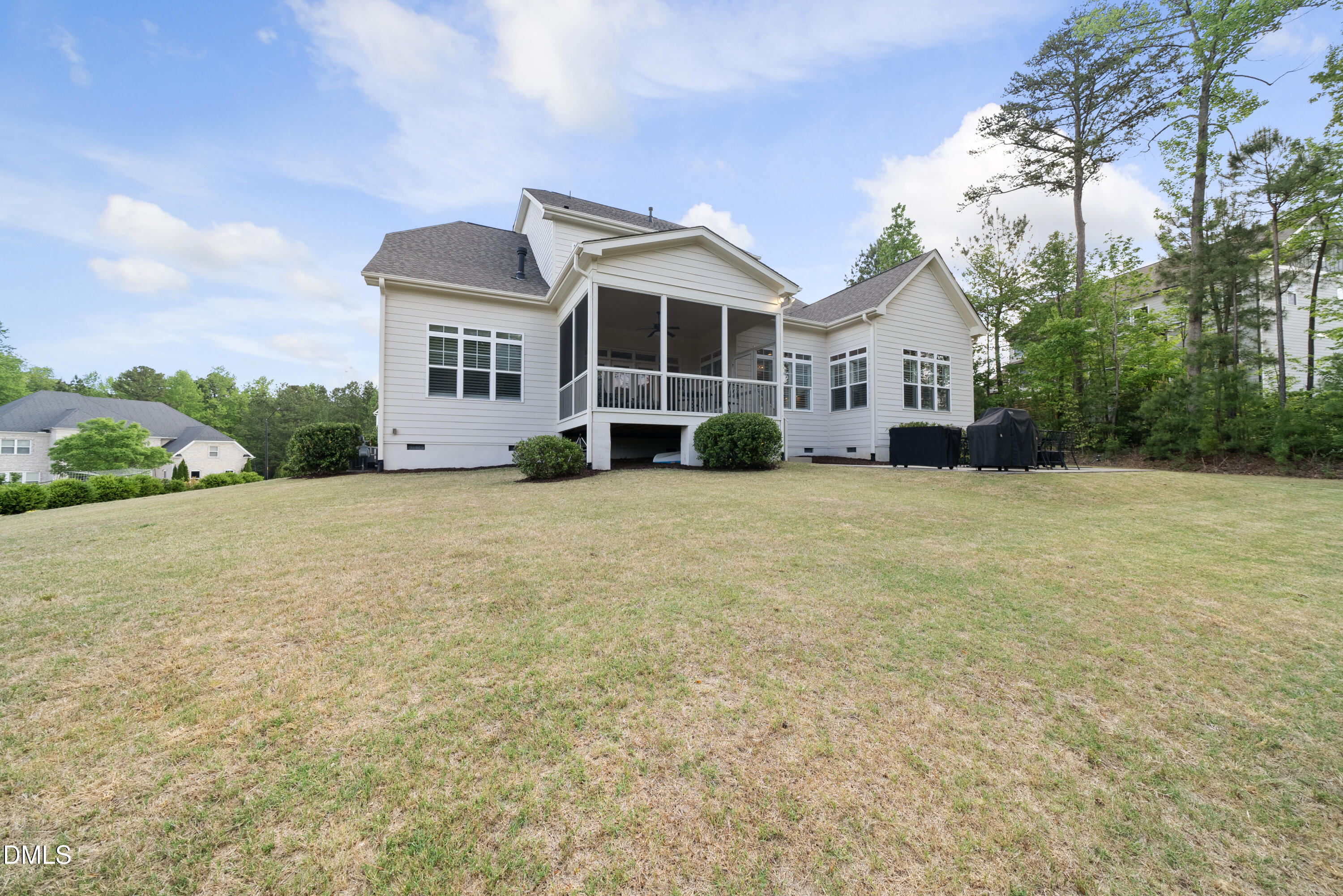 5109 Wainscott Way Raleigh, NC 27612 - Photo 41 of 52 a front view of a house with a garden